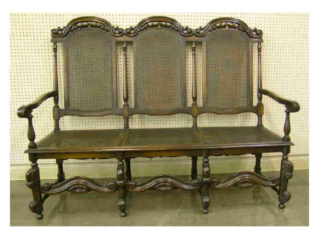 Appraisal: Edwardian-era walnut settle woven back and seat with William and