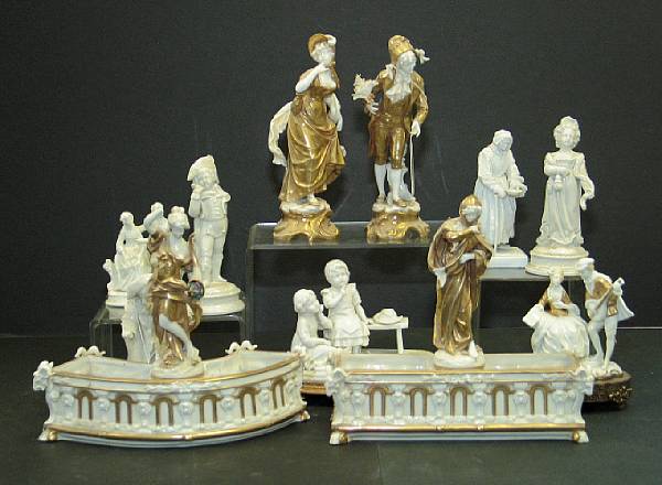 Appraisal: An assembled group of Continental white and gilt porcelain figures