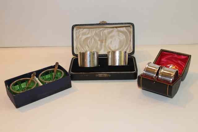 Appraisal: A CASED PAIR OF SILVER NAPKIN RINGS of plain form