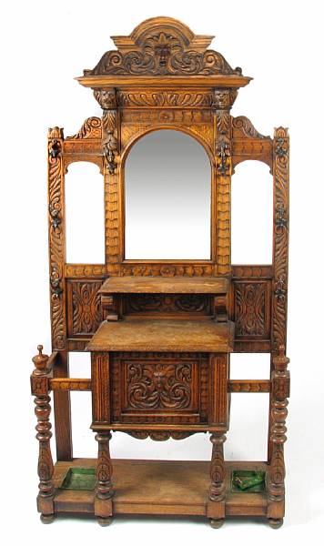 Appraisal: A Victorian carved oak hall stand late th century two