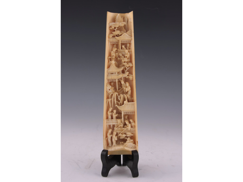 Appraisal: Qing Dynasty Carved Ivory Arm Rest from a tusk section