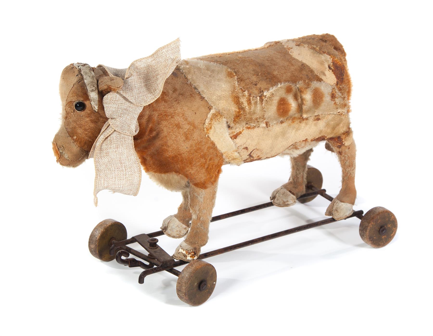 Appraisal: STEIFF BULL PULL TOY Germany ca Brown and beige worn