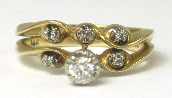 Appraisal: DIAMOND AND FOURTEEN KARAT GOLD RING with five round-cut diamonds