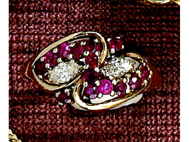 Appraisal: DIAMOND AND RUBY RING k gold ring set with two