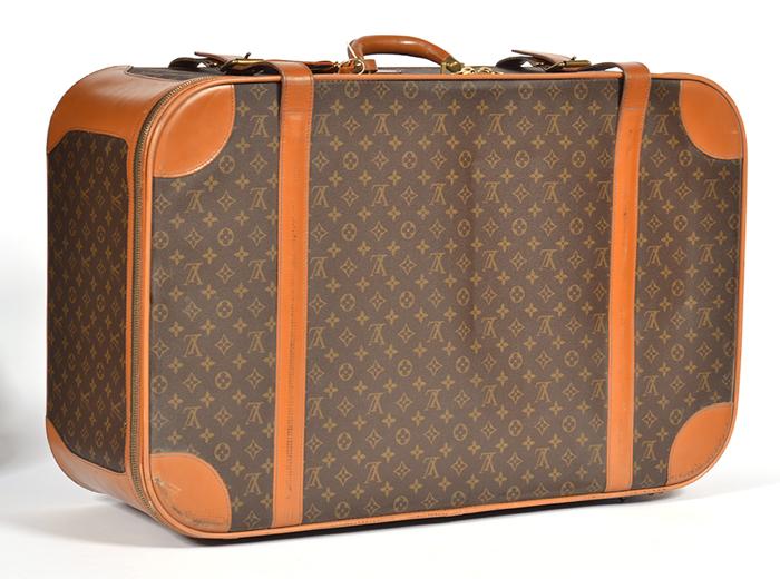 Appraisal: A LARGE LOUIS VUITTON SUITCASE MADE IN USA