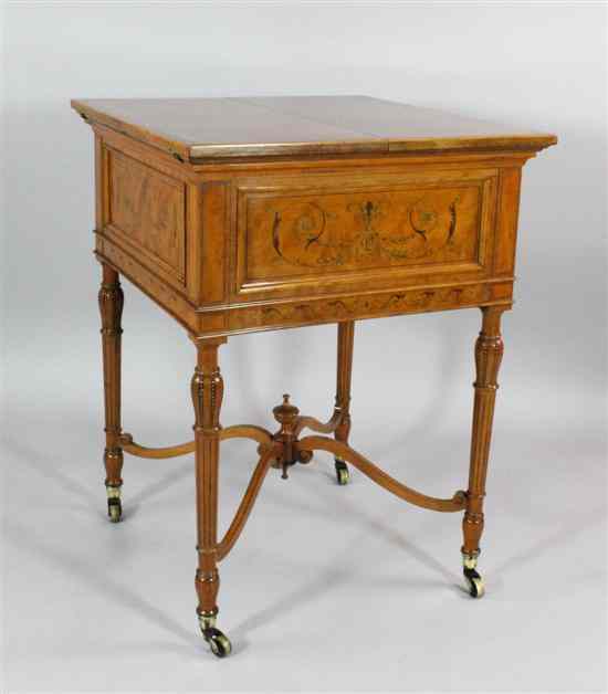 Appraisal: An Edwardian inlaid satinwood and rosewood crossbanded metamorphic drink's table