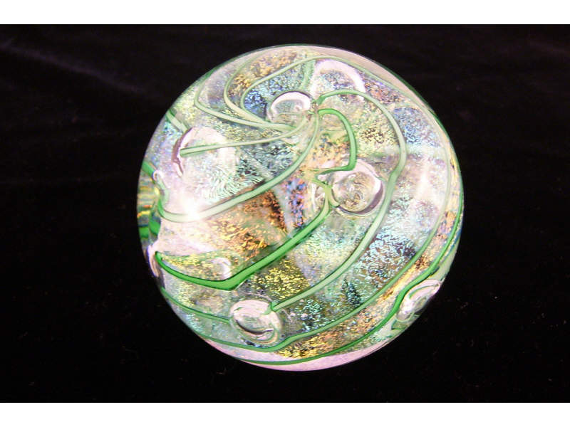 Appraisal: Glass Eye Studio Paperweight Green swirl design with bubbles and