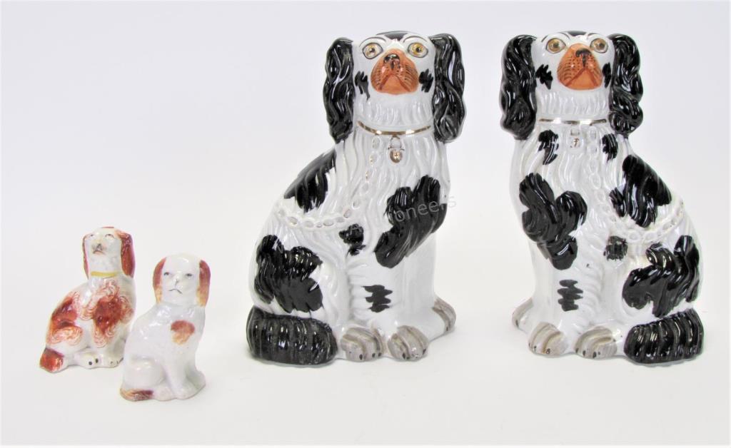 Appraisal: Four Staffordshire Porcelain Dogs pair of white dogs with black