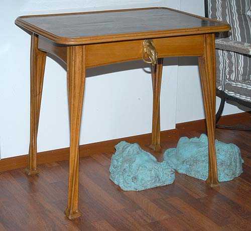 Appraisal: SALON TABLE probably Louis Majorelle circa Mahogany birch and fruitwoods