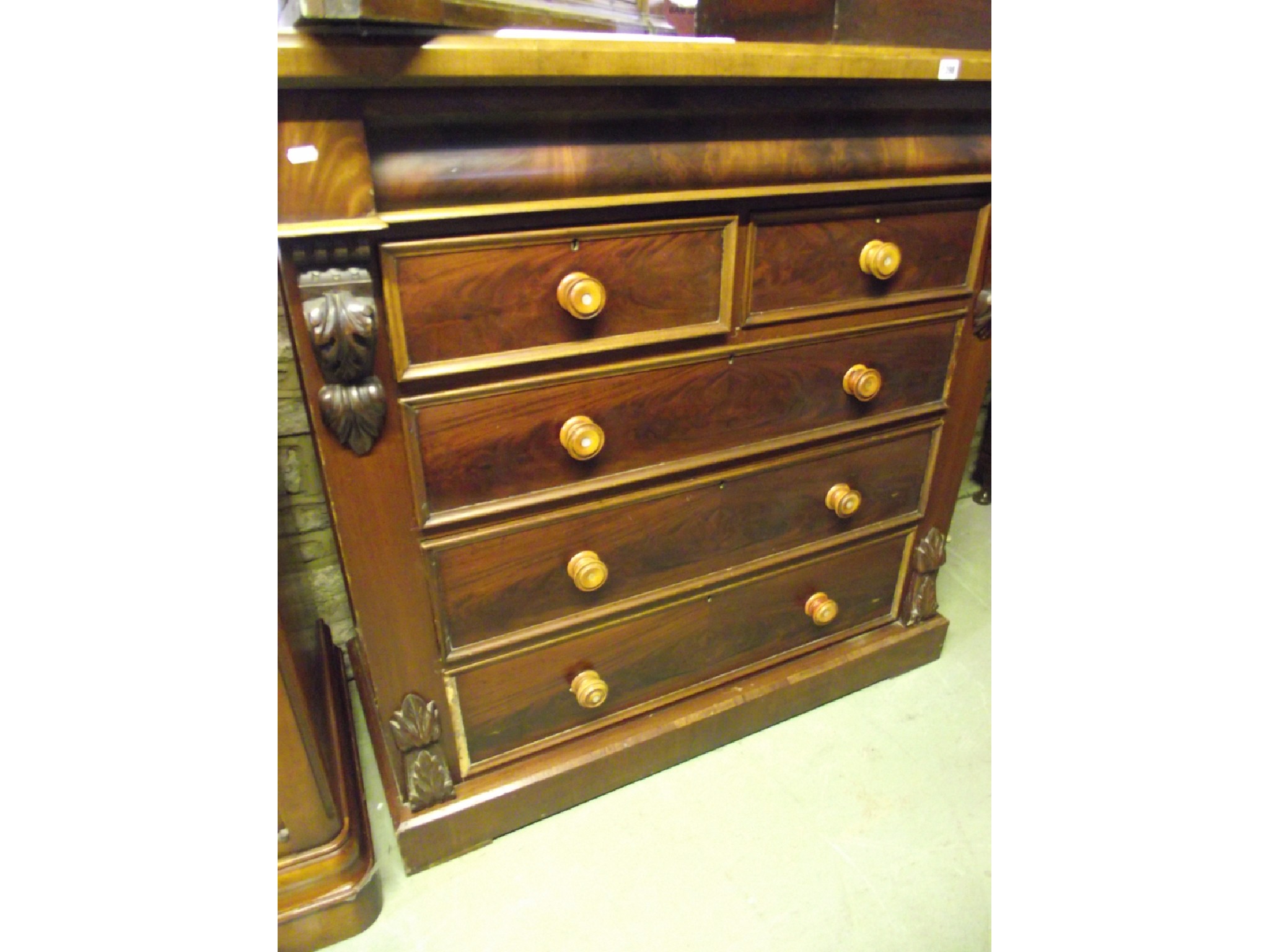 Appraisal: A Victorian mahogany chest of three long and two short