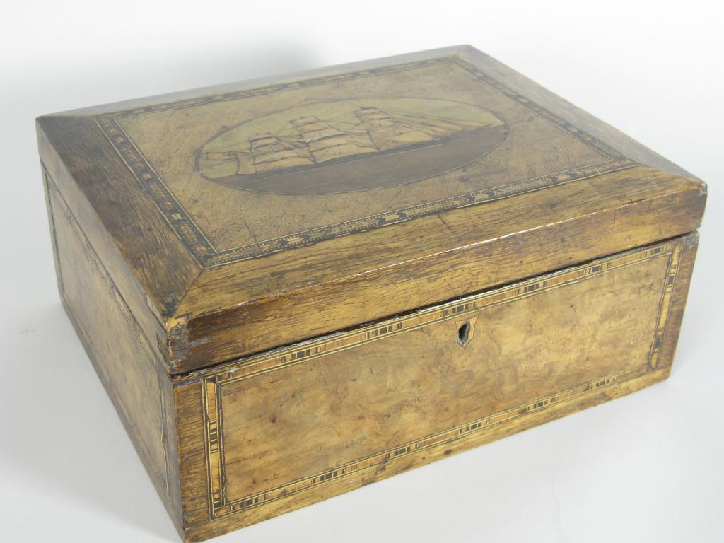 Appraisal: A th Century walnut Sewing Box the cover having inlaid