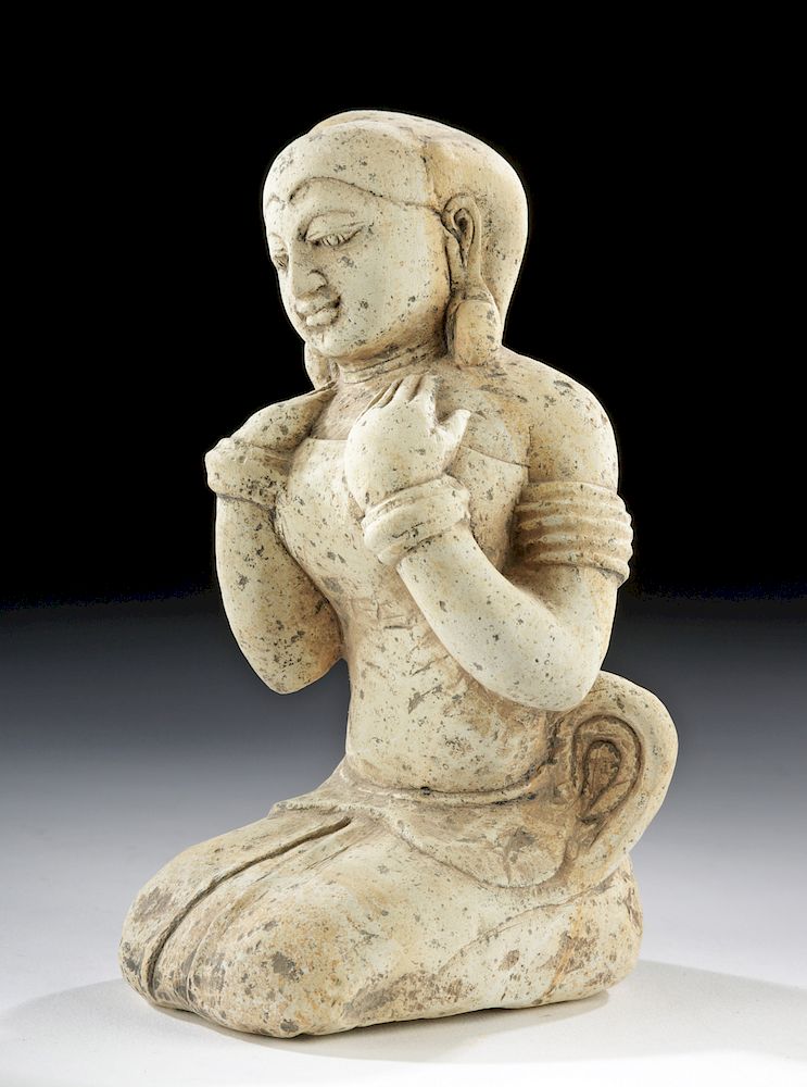 Appraisal: Majapahit Limestone Kneeling Woman Indonesia the island of Java Majapahit