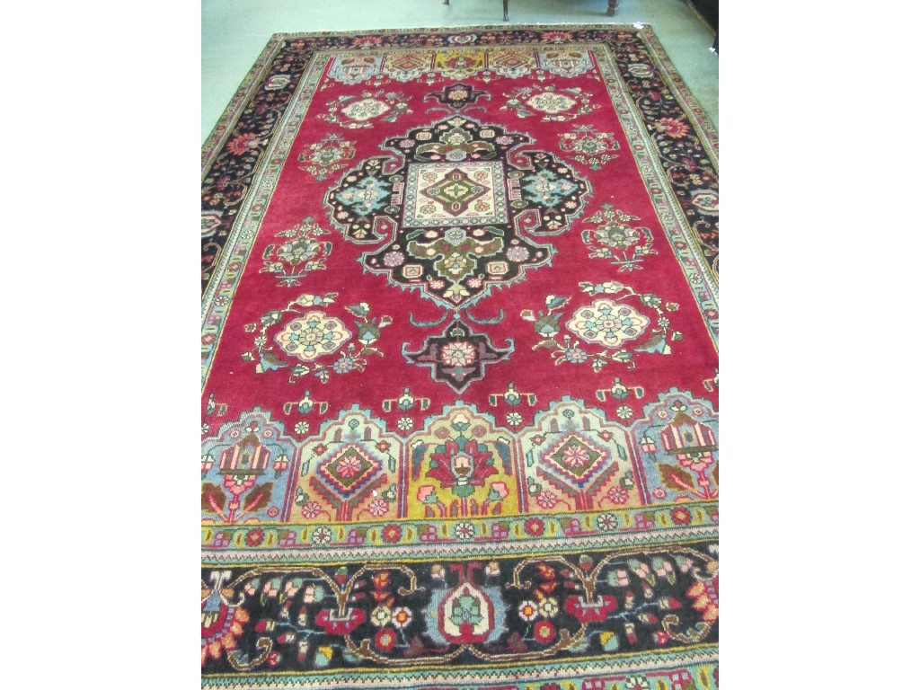 Appraisal: Tabriz multi coloured floor rug