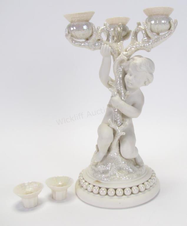 Appraisal: Belleek Porcelain Figural Candelabra by artist Albert Elliott depicting putto