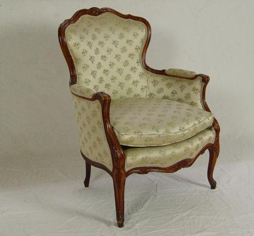 Appraisal: CARVED FRENCH BERGERE Shell carved frame French feet Upholstered in