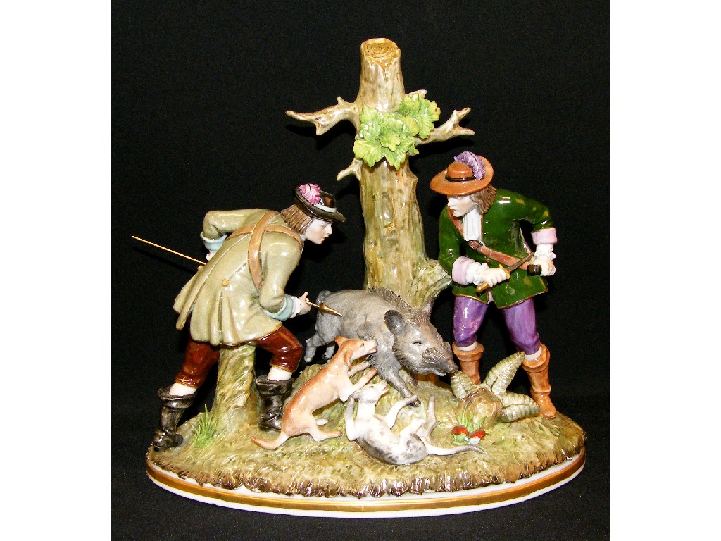 Appraisal: Sitzendorf porcelain figural group depicting hunters and their hounds attacking