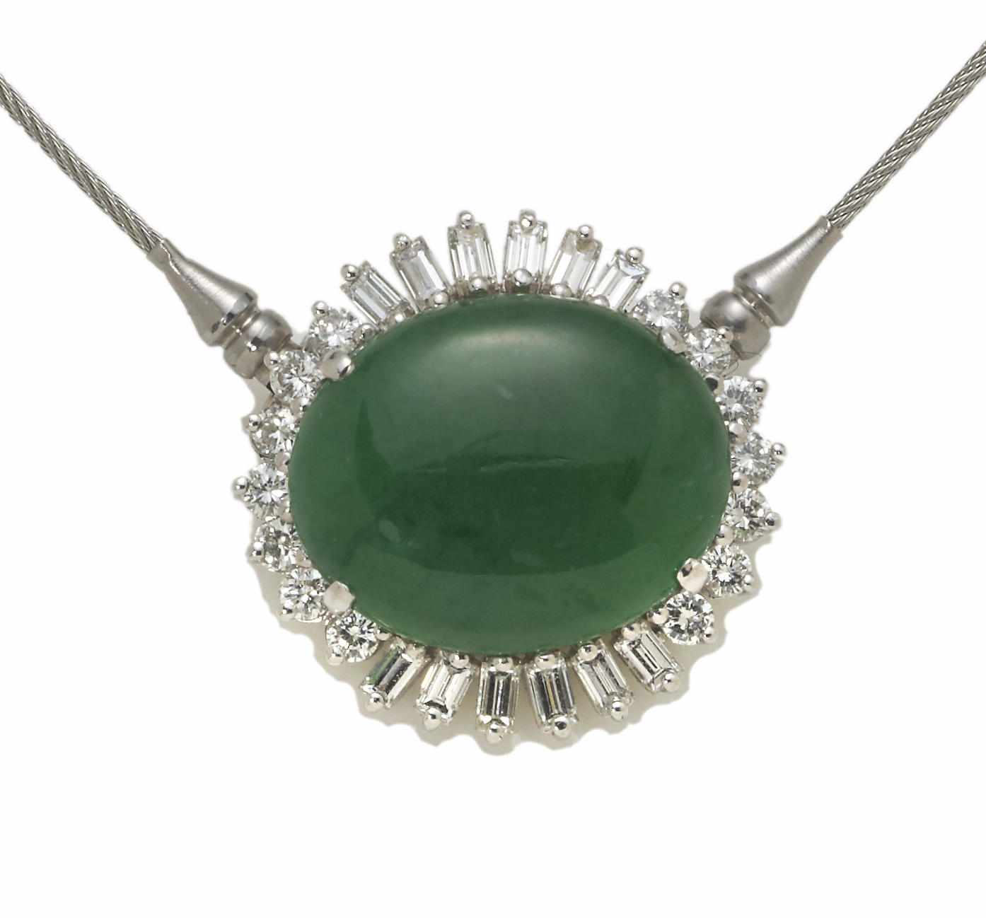 Appraisal: A jadeite jade and diamond pendant necklace steel cable wire