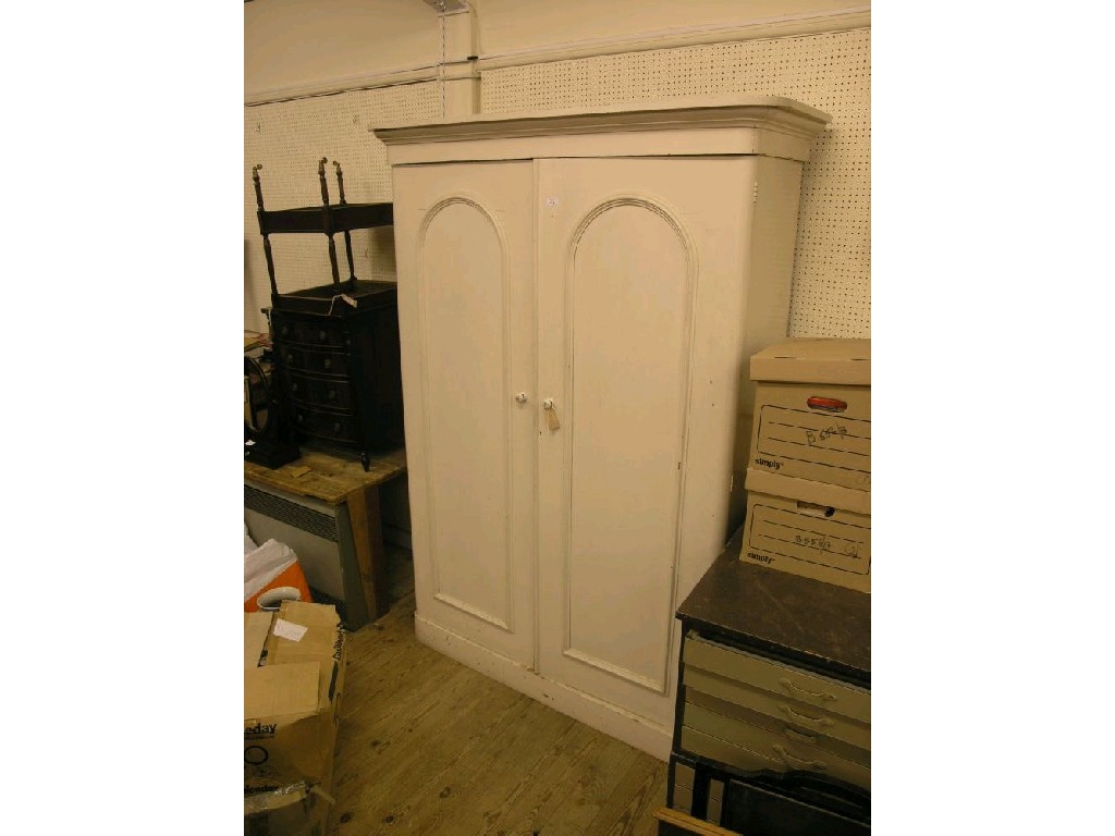 Appraisal: A Victorian painted pine wardrobe pair of full-length panelled doors