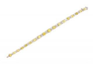 Appraisal: A Platinum Treated Color Diamond and Diamond Bracelet dwts A