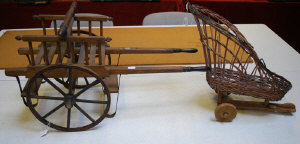 Appraisal: Baby's wooden toy cart to w a similar wicker version