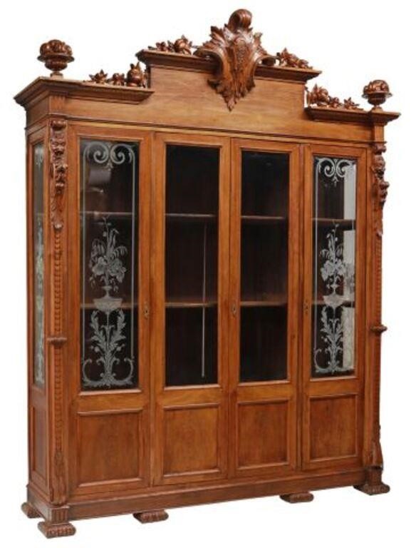 Appraisal: Monumental Italian walnut bookcase late th c carved acanthus crest