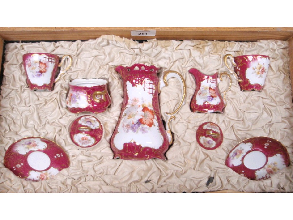 Appraisal: A continental porcelain transfer and painted coffee set in original