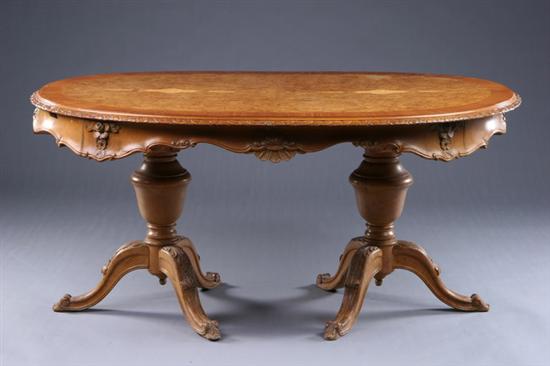 Appraisal: FRENCH PROVINCIAL DOUBLE-PEDESTAL DINING TABLE th century walnut Walnut bookmatched