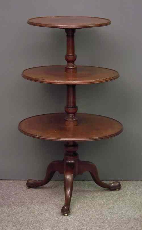 Appraisal: A George III mahogany circular three tier dumb waiter with