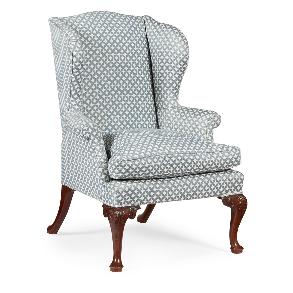 Appraisal: GEORGE III STYLE WING ARMCHAIR TH CENTURY the tall padded