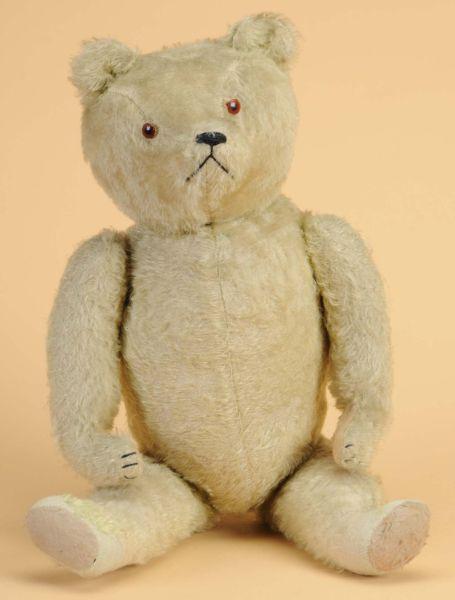 Appraisal: English Teddy Bear England ca a straw stuffed jointed white