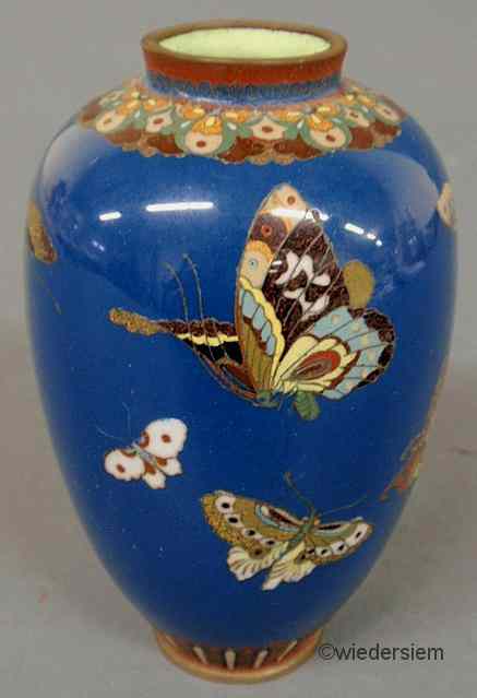 Appraisal: Cloisonn vase th c with colorful butterfly decoration on a