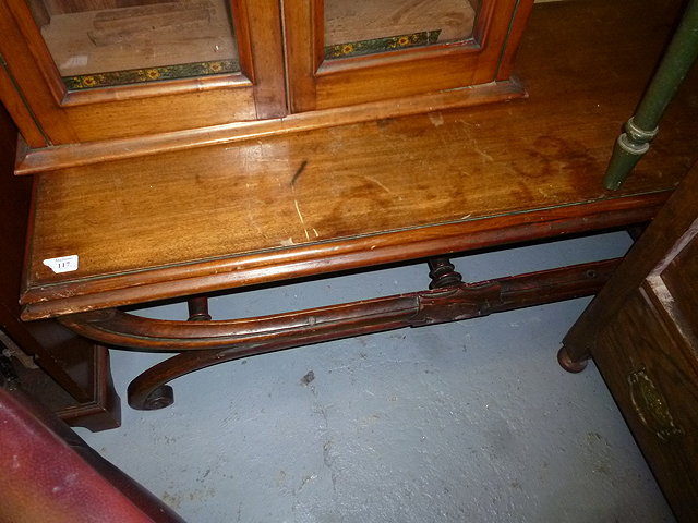 Appraisal: A MAHOGANY LOW OCCASIONAL TABLE 'X' framed support united by