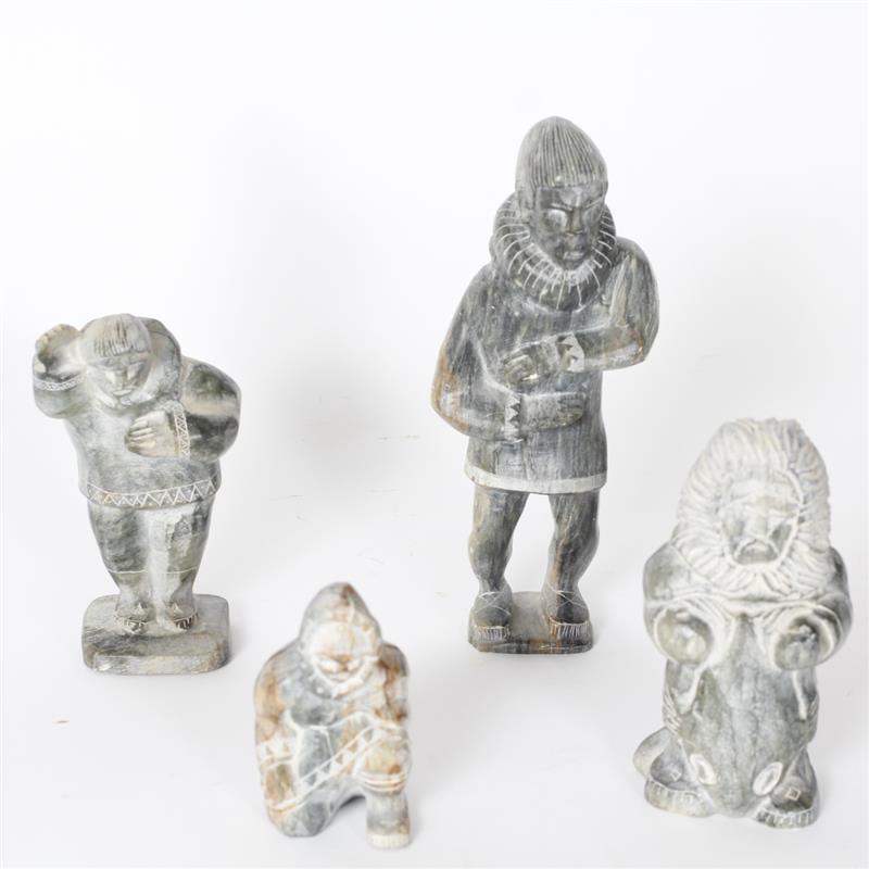 Appraisal: Four Inuit soapstone figure carvings signed Yuoalook H x W