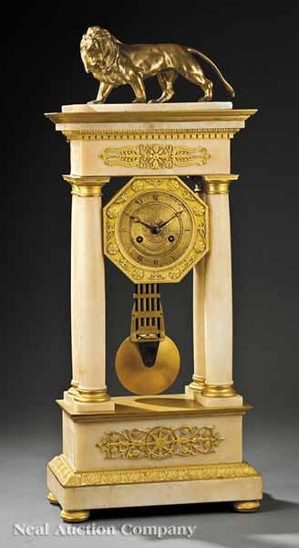 Appraisal: A French Marble and Gilt Bronze Portico Clock th c