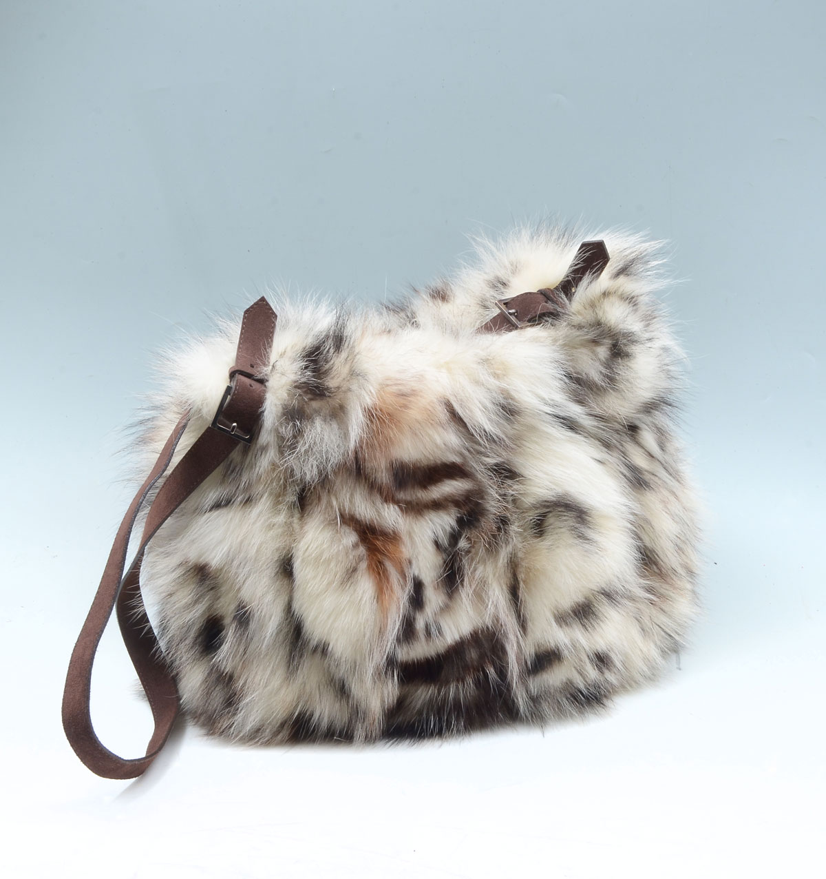 Appraisal: SPOTTED LYNX FUR PURSE Spotted lynx purse has dark brown