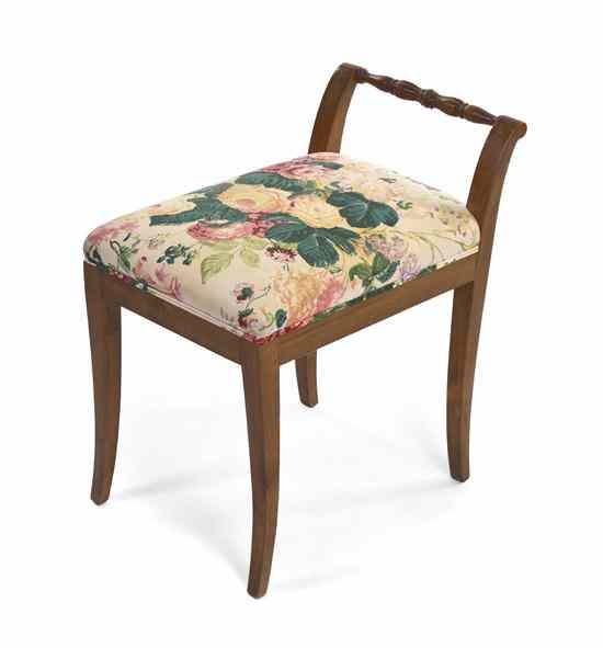 Appraisal: A Continental Upholstered Dressing Bench having a rectangular seat and