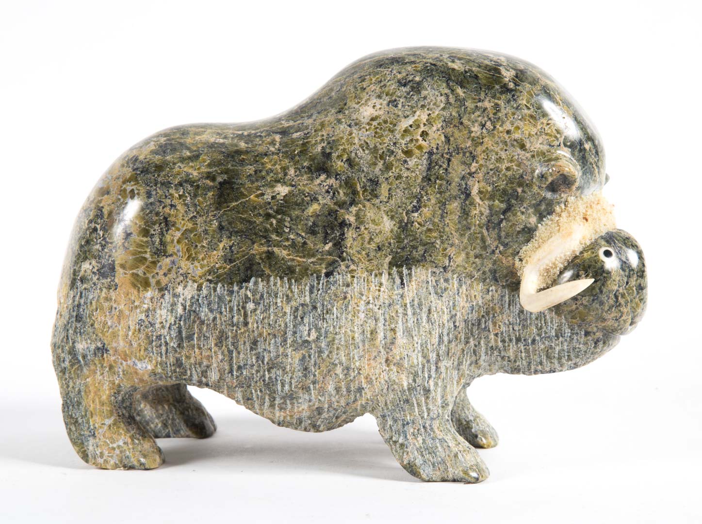 Appraisal: Osuitok Ipeelee Soapstone Musk Ox Canadian - signed in syllabics