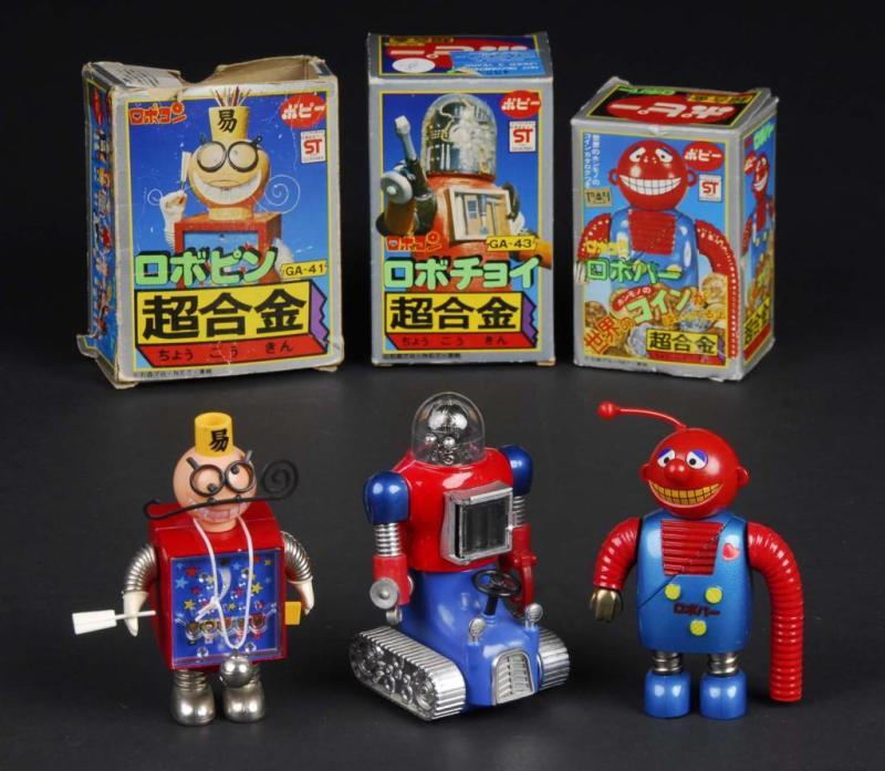 Appraisal: Lot of Robocon Die-Cast Toys Description Japanese Made by Popy