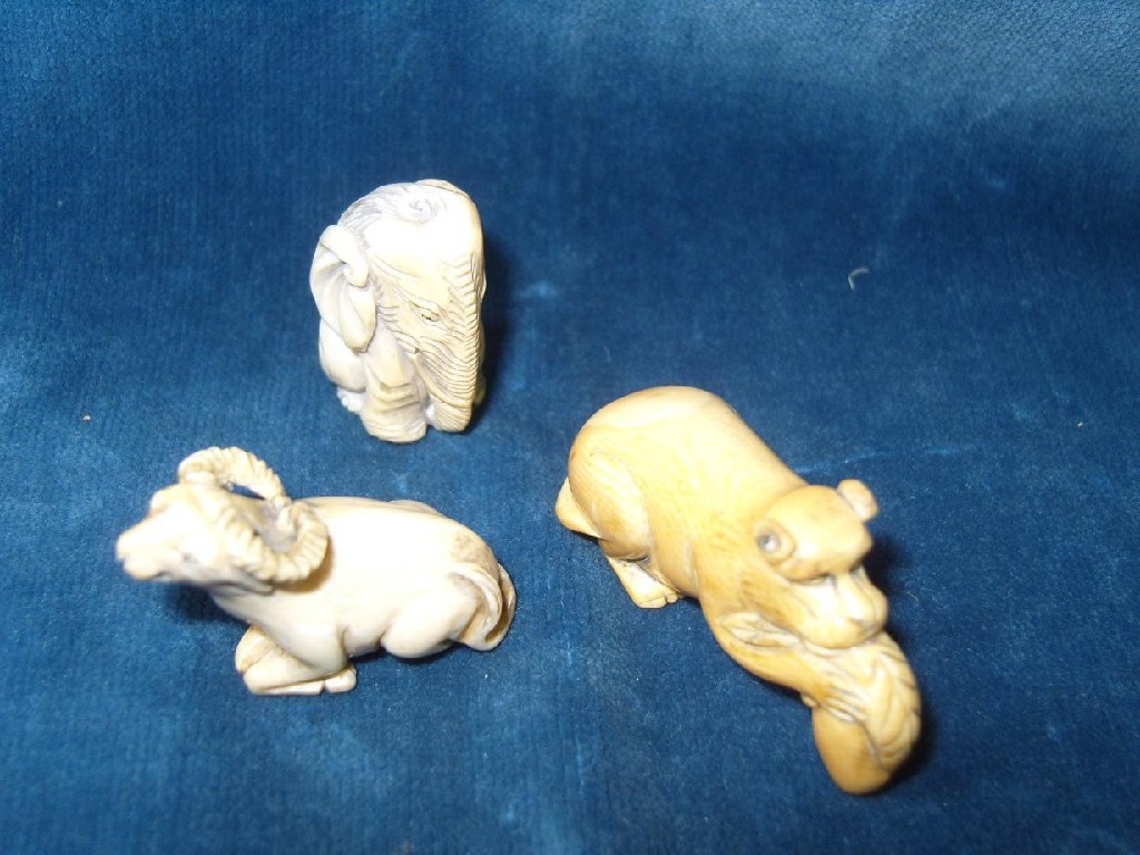 Appraisal: A collection of three Japanese carved ivory figures in the