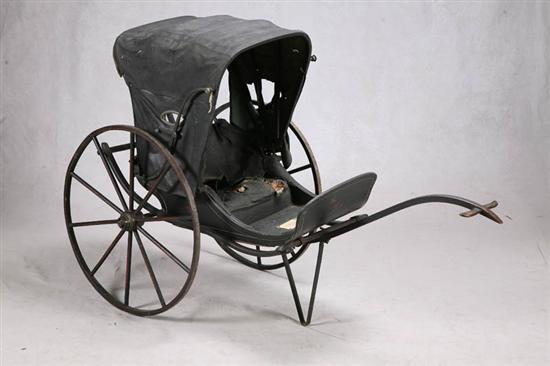 Appraisal: BABY BUGGY Two wheeled wooden cart with paint decoration Leather