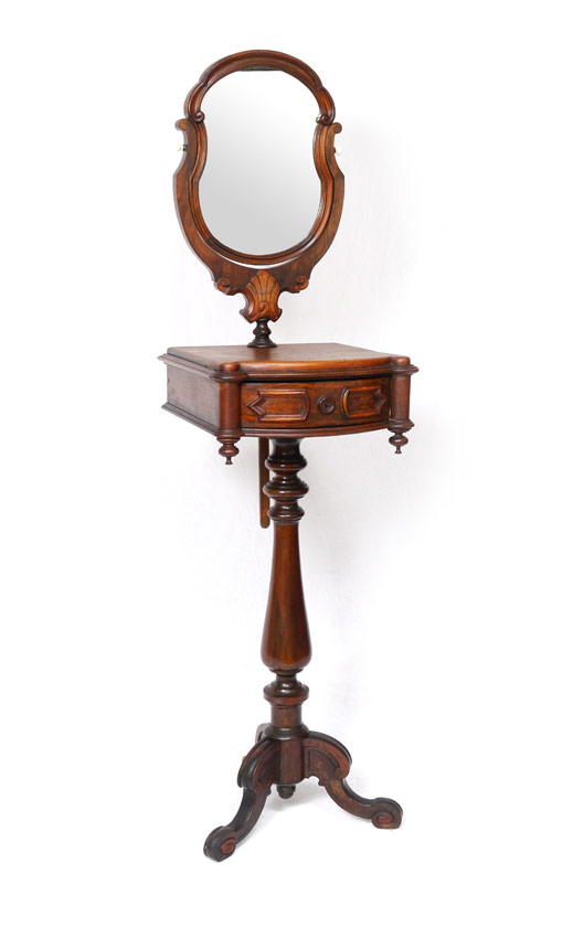 Appraisal: VICTORIAN WALNUT SHAVING STAND Shaped mirror with carved frame support