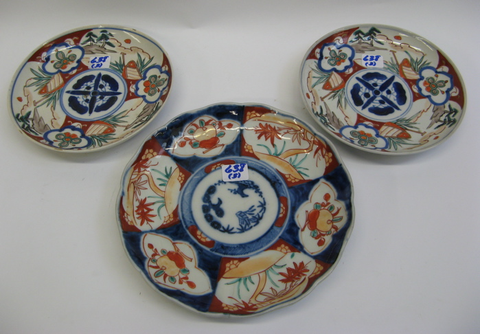 Appraisal: THREE JAPANESE IMARI PORCELAIN PLATES a matching pair in diameter