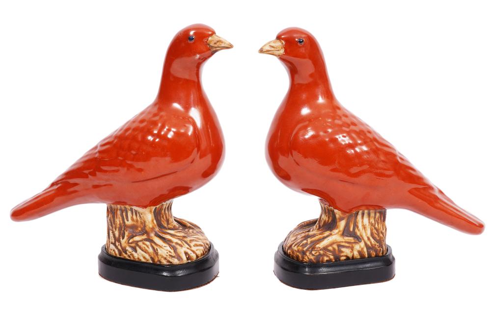 Appraisal: PR CHINESE PAINTED CERAMIC BIRDSPair of Chinese painted ceramic birds