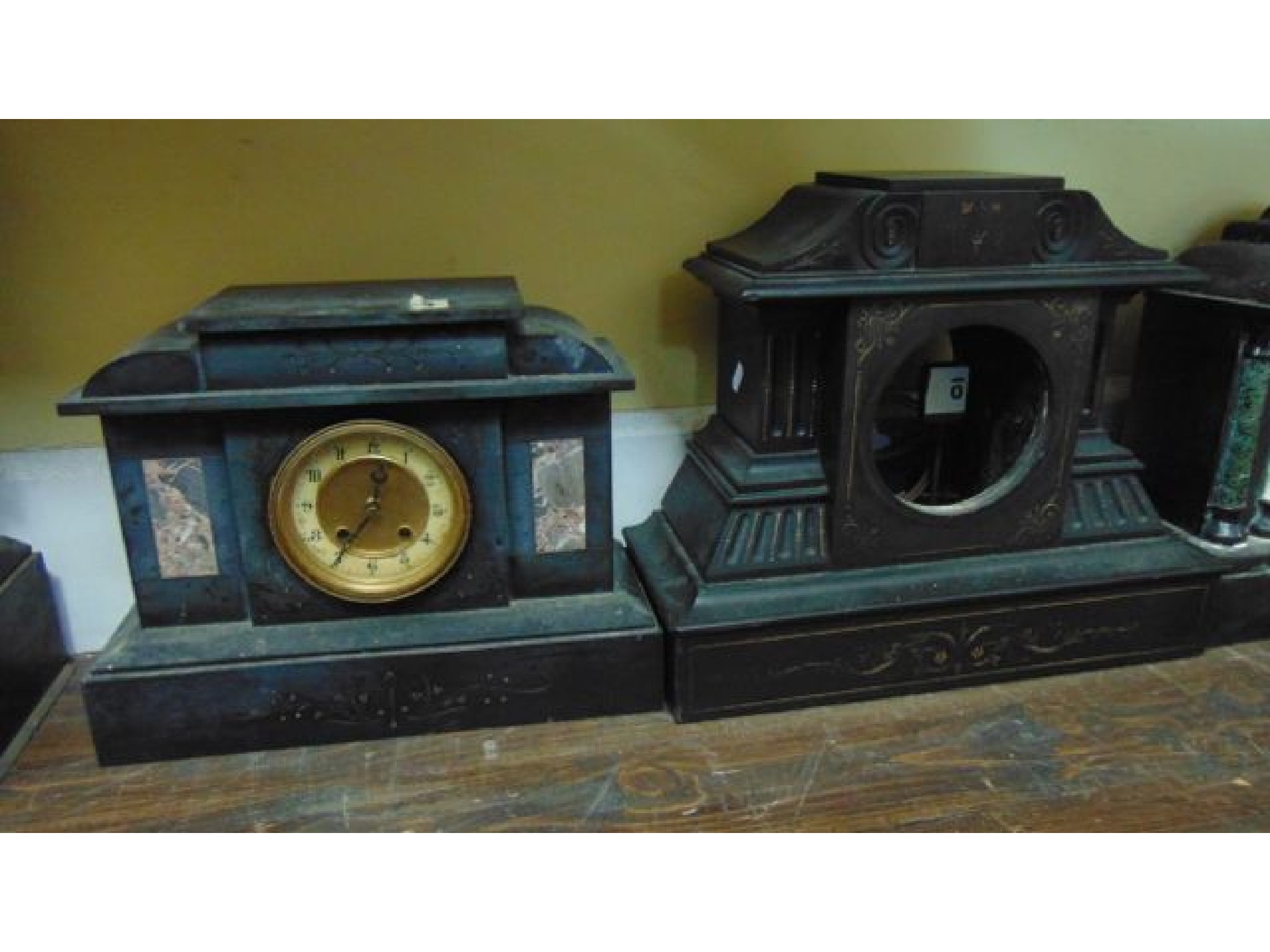 Appraisal: A Victorian black slate and marble mantle clock with eight