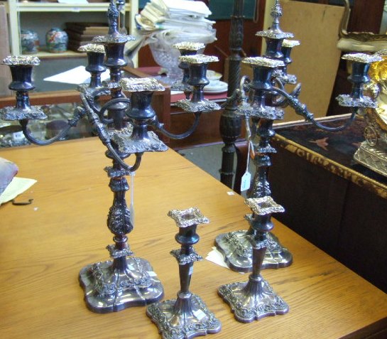 Appraisal: A pair of plated five light table candelabra with floral