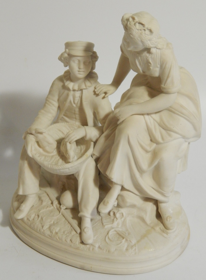 Appraisal: A thC Parian figure group of a boy and a