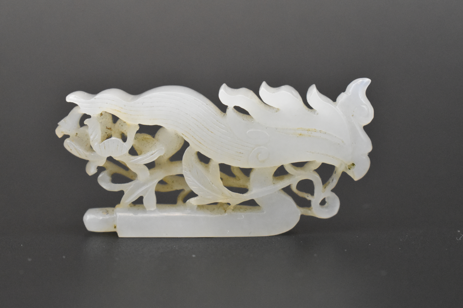 Appraisal: A Chinese jade carved phoenix hairpin dating from the Ming