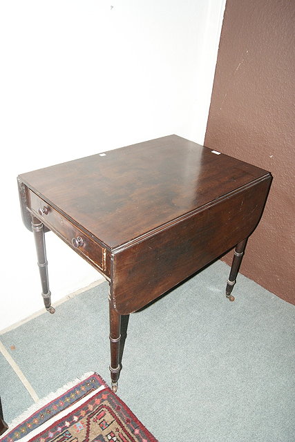 Appraisal: th Century mahogany Pembroke tablewith two drop flaps on turned