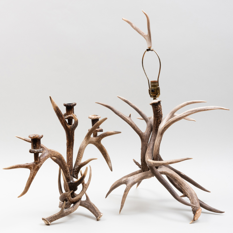 Appraisal: AUSTRIAN ANTLER LAMP AND AN ANTLER THREE-LIGHT CANDELABRA The lamp