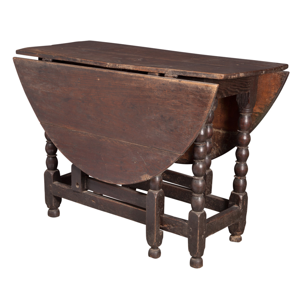 Appraisal: Carolean Oak Drop-Leaf Table The two-plank rectangular top with bowed